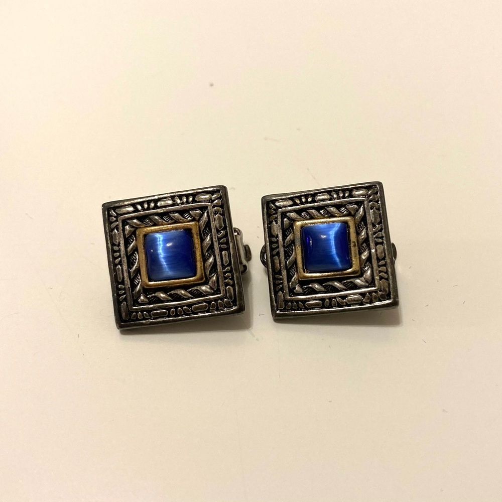Vintage clip-on two-tone square earrings with cobalt blue stone.